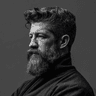 AI-generated portrait of Tomás Coen, persona for the Combat sports desk